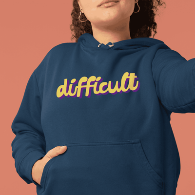 "difficult" grace tame hoodie - unisex - on AS Colour Relax - cobalt mockup - fthis