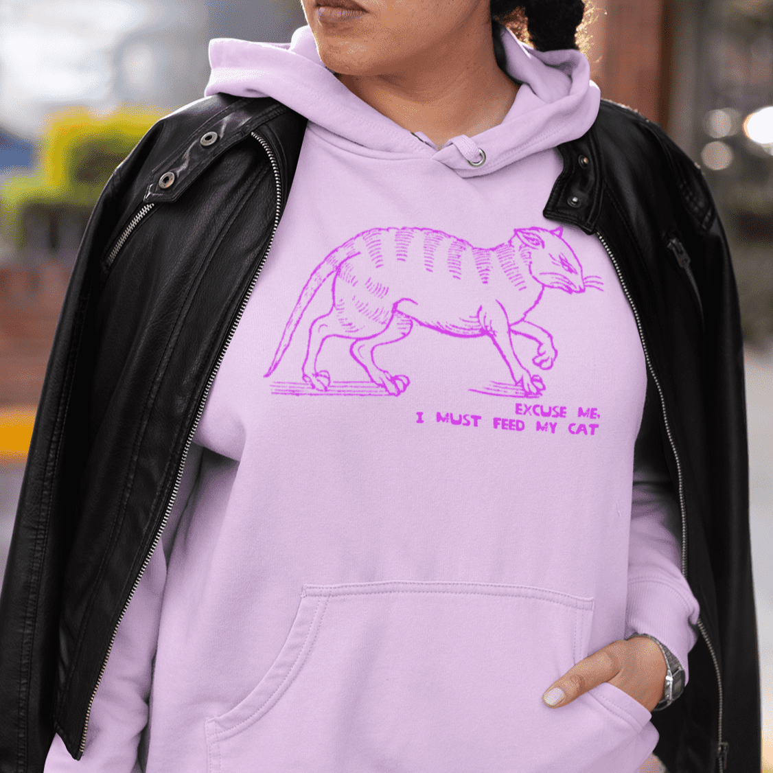 "I must feed my cat" medieval woodcut design women's hoodie in orchid mock up - fthis