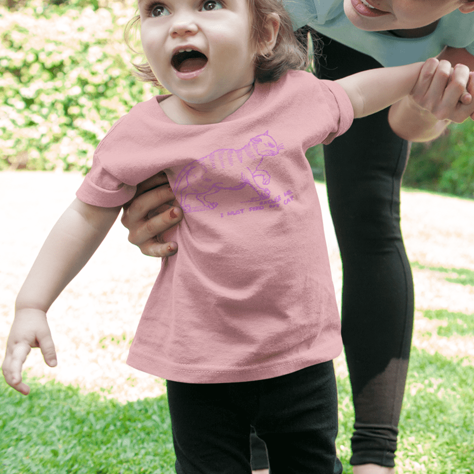 "I must feed my cat" baby t-shirt in pink - mockup - fthis